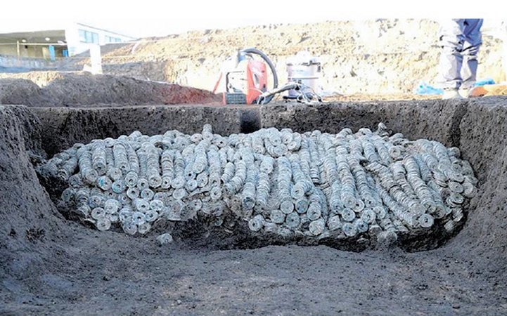 Incredible Trove Of 100,000 Ancient Coins Tied Together In Bundles Uncovered In Japan