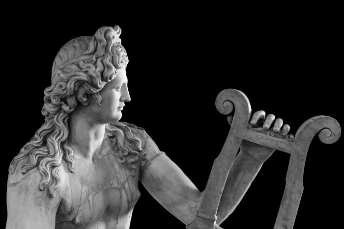 Ancient Roman statue of God Apollo playing a lire. Image credit: Adobe Stock - giorgio