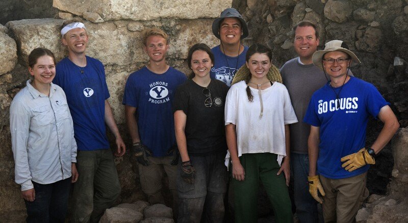 Team of BYU students working on the Huqoq Excavation Project and archaeological field school during the 2022 season: (left to right) Serena Wilson, Calan Christensen, David Eastley, Allyson Huffmire, Jared Corbett, Lea Schade, Prof. Matthew Grey, and Isaac Richards. Jim Haberman