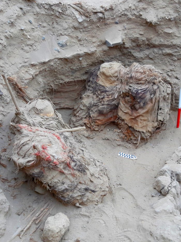 73 Intriguing Burial Bundles And Carved Masks Placed On False Heads Discovered In Peru