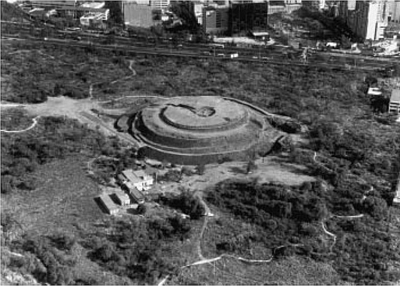 What is left of the remains of Cuicuilco city is buried and preserved in the lava flow. But one pyramid, a circular pyramid showing designs of an agricultural system, was preserved, with the lava flow flowing around it. In the 1990s, archeological digs at and around this site brought about a better understanding of the location and discovery of the buried city of Cuicuilco. What was the most important find was charcoal samples found under the layer of lava. Image credit: Siebe, 2000