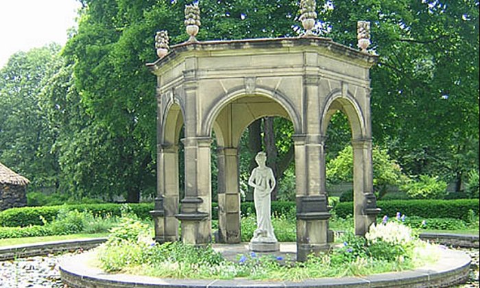 Grotto (far left) and statue of Harmonia in the Harmony Society gardens in Old Economy Village, Pennsylvania.