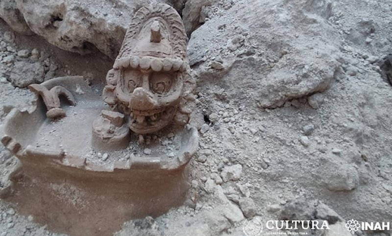 The three-dimensional depiction of the Mayan god K'awiil, uncovered during an archeological rescue dig on Section 7 of the Maya Train route. (INAH)