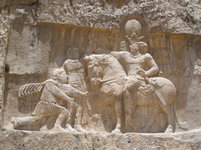 Roman emperor Valerian surrenders to Shapur I.